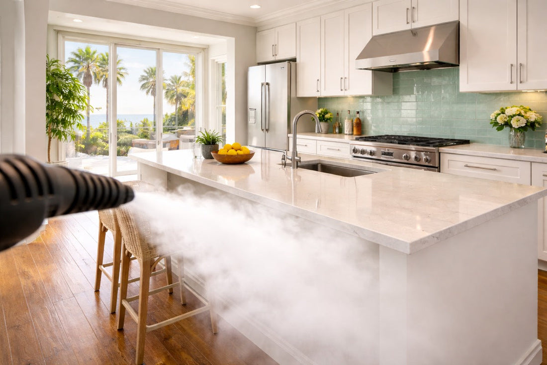 Move out cleaning San Diego - steam cleaning a kitchen surface before a final walkthrough
